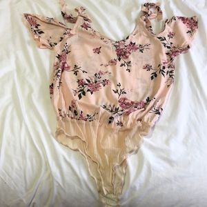 Kendall and Kylie open shoulder body suit